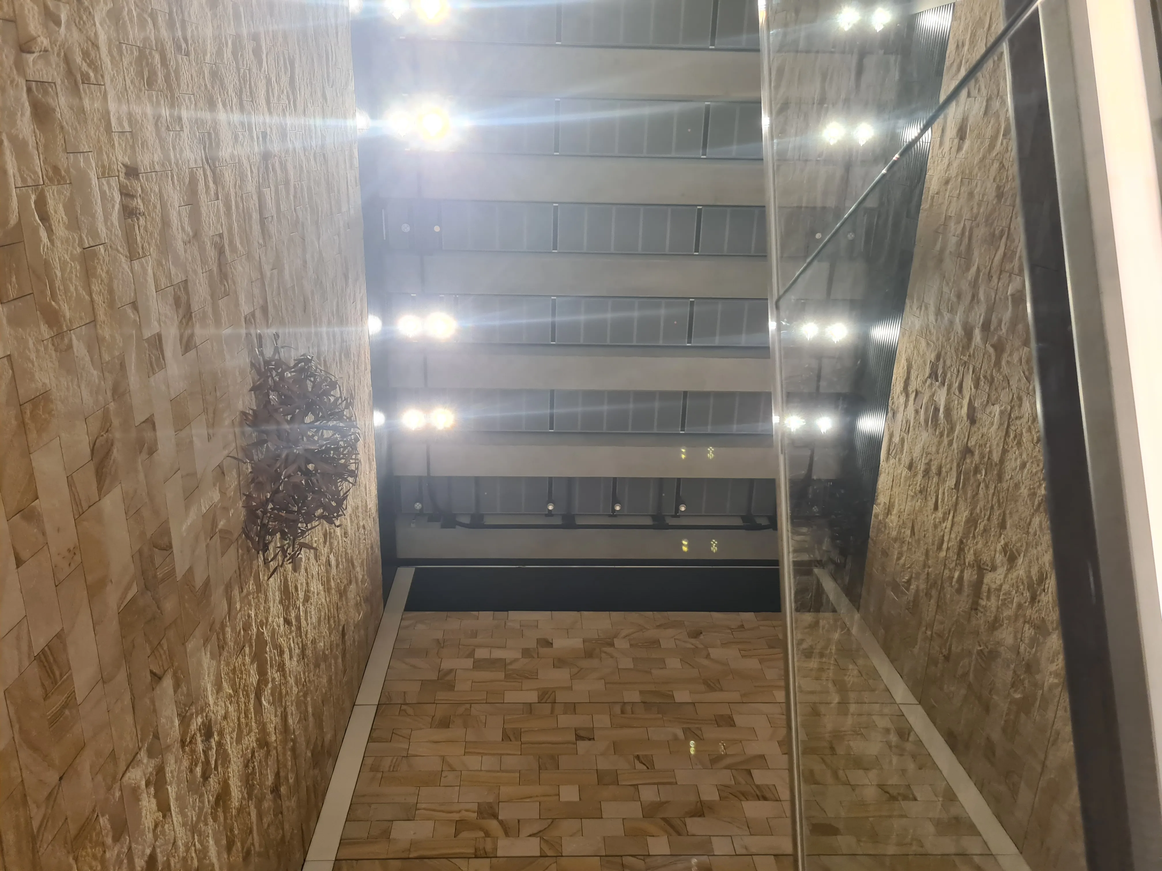 Up-facing shot of the station atrium from the platforms.